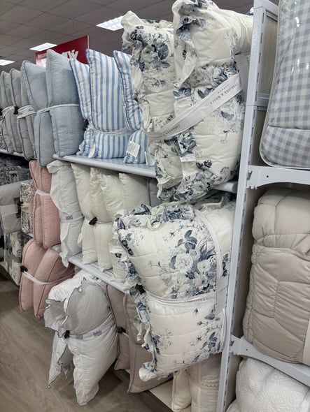 2026_home_goods_cabbages_and_roses_dark_blue_ruffle_pillows